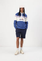 Ellesse long-sleeve rugby polo with blue, lilac and cream colour blocks