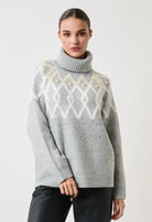 Women's Desiree knit turtleneck with raised diamond patterns